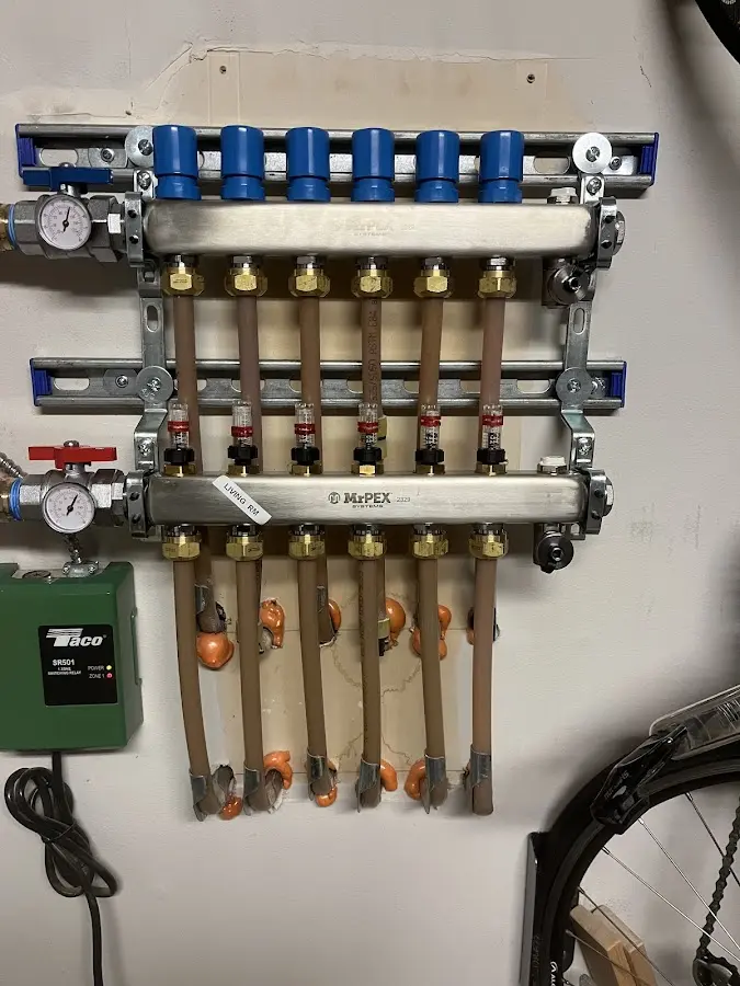 Plumber performing Water Heater Repair at a residential property in Davison